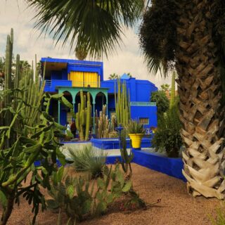 Majorelle Garden in Marrakech with blue architecture and greenery