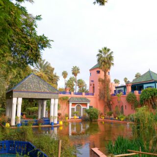 Majorelle Garden in Marrakech with blue architecture and greenery