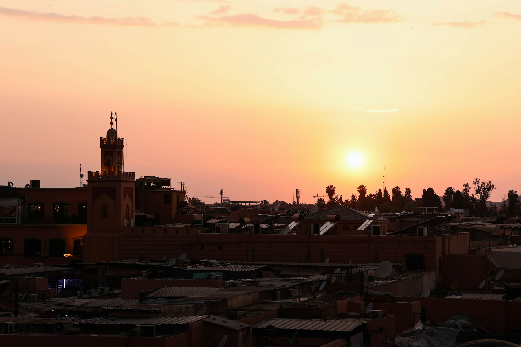 Warm golden sunset over the rooftops of Marrakech, Morocco